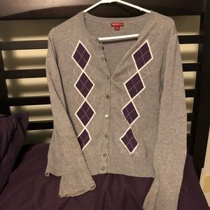 Grey and purple argyle sweater.